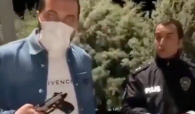 Silahını kontrol etmek isteyen polisleri kayda aldıran maganda
